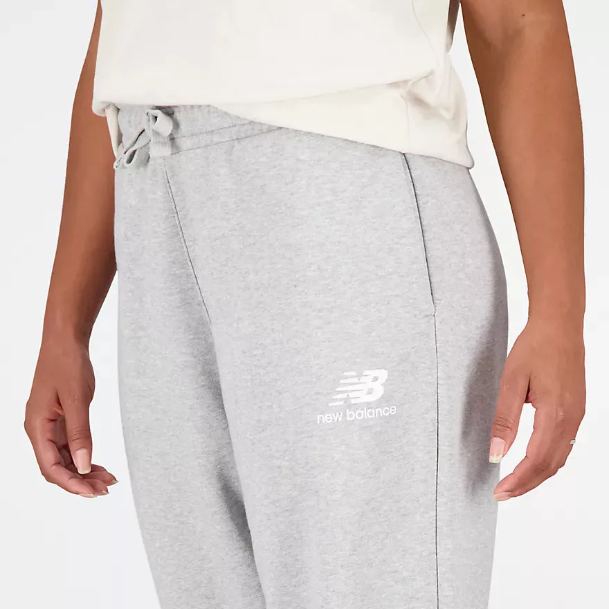 NEW BALANCE ESSENTIALS STACKED LOGO FRENCH TERRY WIDE LEGGED SWEATPANT