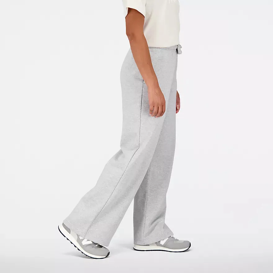 NEW BALANCE ESSENTIALS STACKED LOGO FRENCH TERRY WIDE LEGGED SWEATPANT